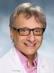 Headshot of Roger Strair, MD, PhD