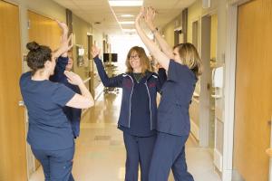 Nurses high fiving