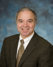 Headshot of Umur Atabek, MD, FACS