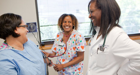 Doctor speaking with nurses