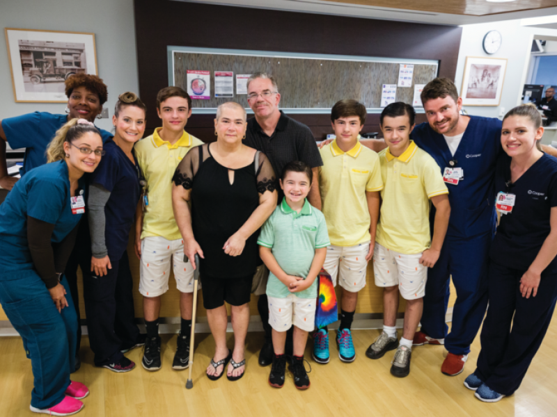 Judith and her family brought gifts to members of the ICU team one month after she was discharged from Cooper.