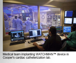 Medical team implanting WATCHMAN™ device in Cooper's cardiac catheterization lab.